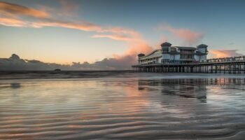 Best Deck Stain for Coastal Climates pier, sunset, coast, weston, nature, sea, reflections